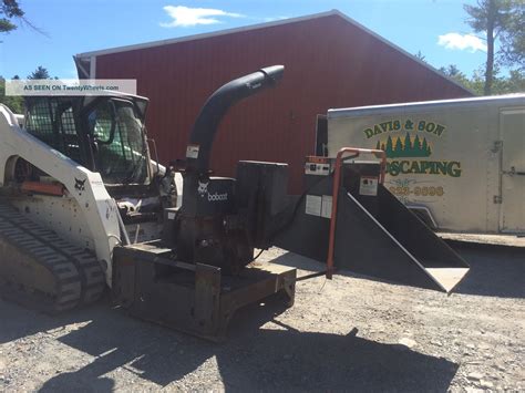 bobcat skid steer wood chipper|bobcat with rotary grinder.